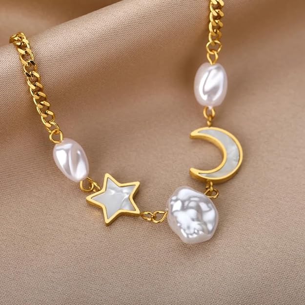 Bracelet made of gold with moon and stars motif.