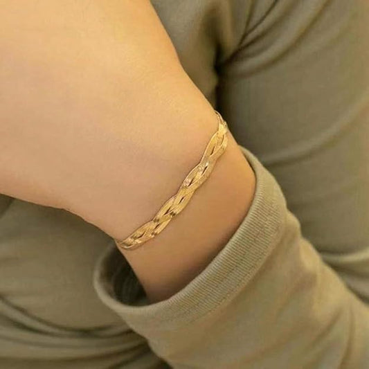 Stylish gold bracelet featuring intricate chain link design.