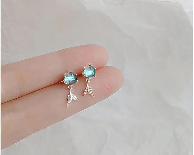 Sterling silver earrings featuring stunning blue topaz stone.