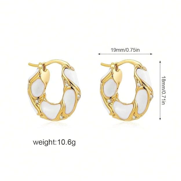 Earrings featuring gold hoops and white stones.
