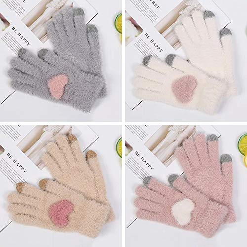 Fuzzy pink heart-shaped gloves adorned with white hearts, perfect for keeping hands warm and stylish in winter.