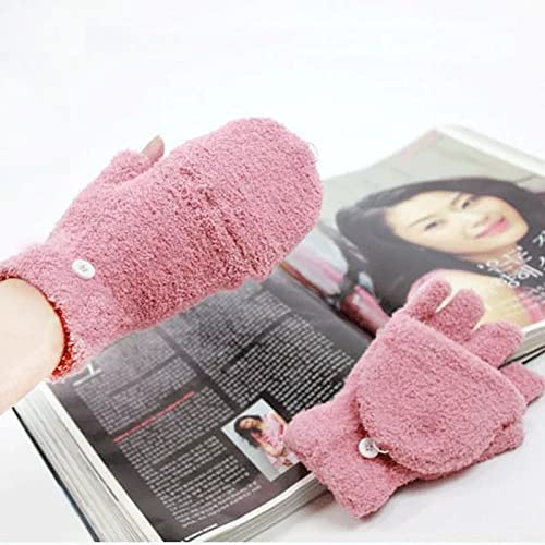 A close-up of a woman's hand clutching a pink fuzzy mitten, emphasizing its warmth and playful design.