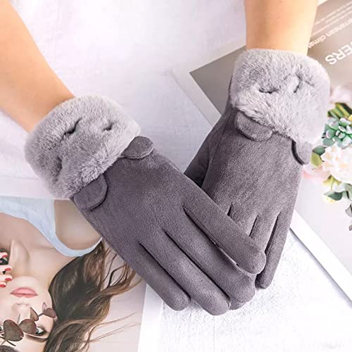 A woman in stylish grey gloves adorned with luxurious fur cuffs, showcasing a chic winter look.
