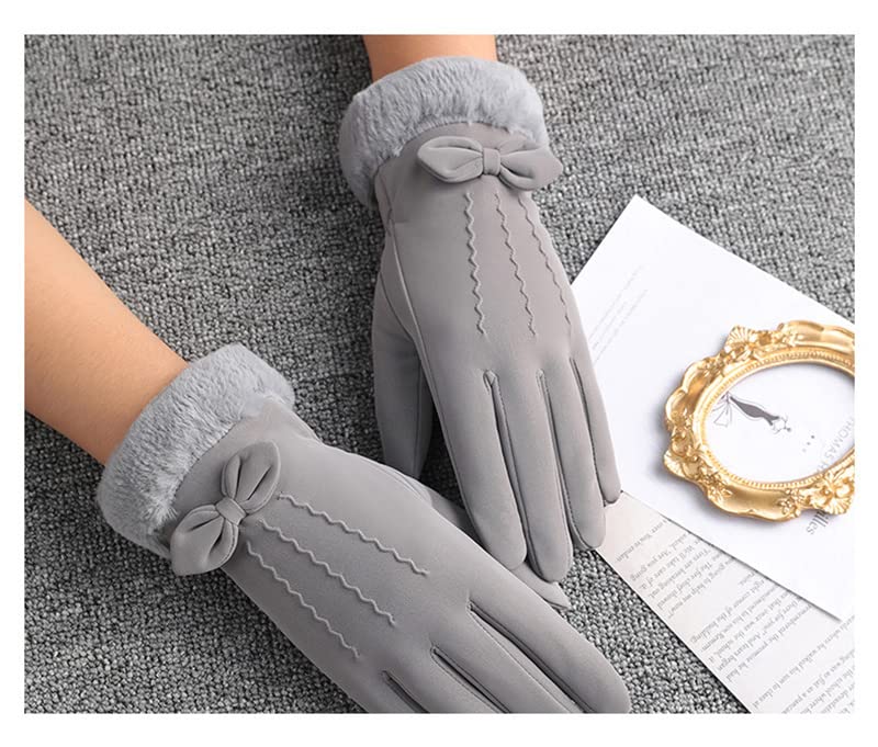 A stylish pair of women's gloves featuring a charming bow detail on the wrist for a touch of elegance.
