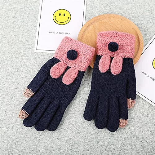 A close-up of two pairs of gloves adorned with pink and blue buttons, showcasing their unique designs.
