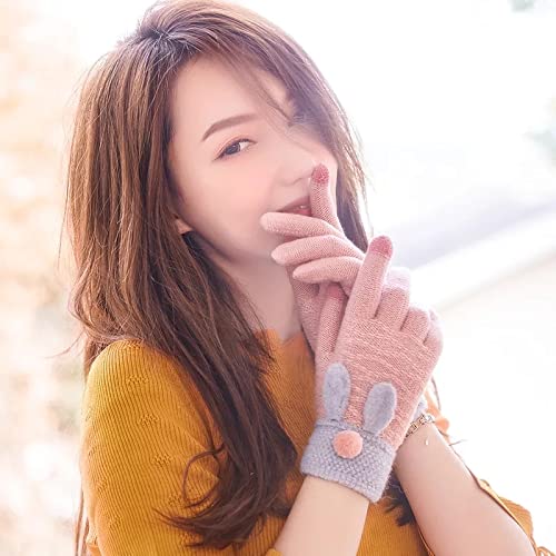 Two pink gloves embellished with grey and white buttons, presenting a delightful and trendy accessory.