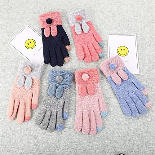 A pair of pink gloves featuring decorative grey and blue pom poms, adding a whimsical touch to winter wear.