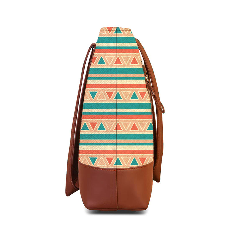 Stylish tote bag featuring colorful geometric patterns.