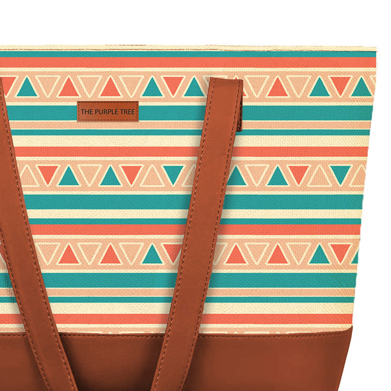 Fashionable tote bag with colorful geometric design.