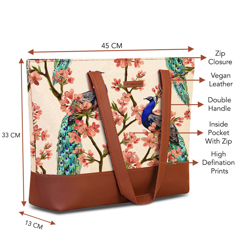 A fashionable tote bag showcasing a striking peacock print, combining practicality with artistic expression for daily use.