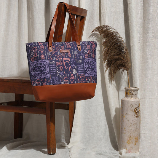 Stylish tote bag featuring a unique blue and brown tribal print design.