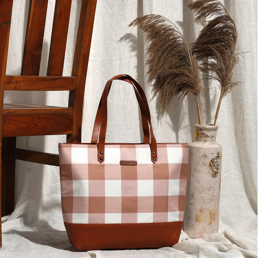 Stylish tan and white plaid tote bag, ideal for a casual day of shopping or running errands.