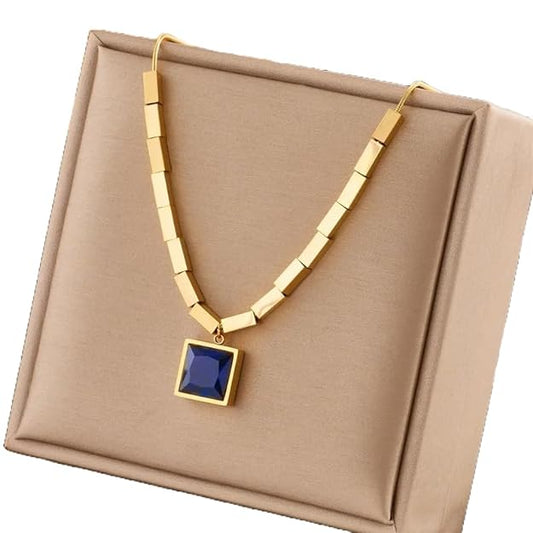 A beautifully crafted gold-plated necklace adorned with a vibrant blue stone, perfect for adding a touch of elegance.