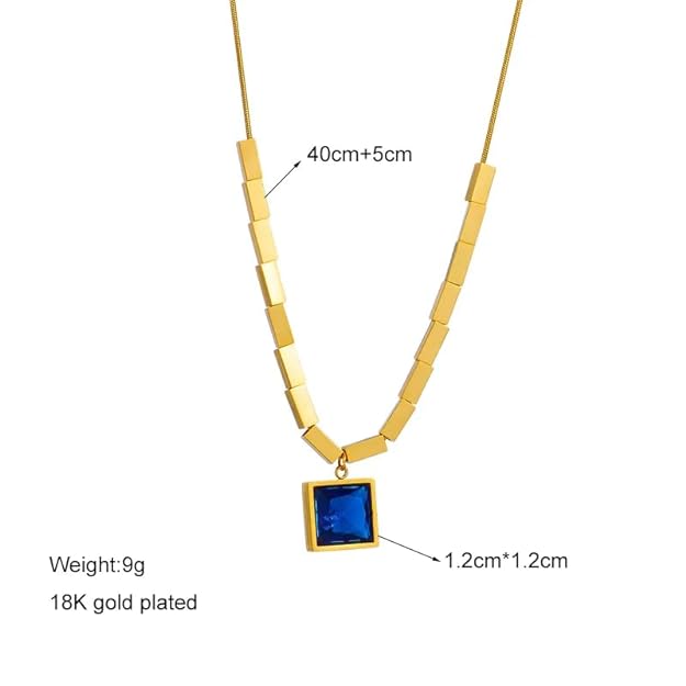 Luxurious gold plated necklace adorned with a beautiful blue gemstone.