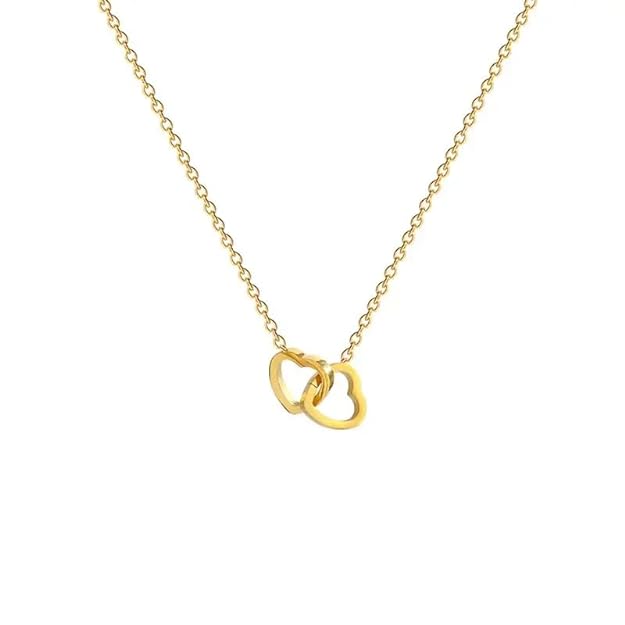 Gold heart necklace with red heart pendant, perfect for adding a touch of love to any outfit.
