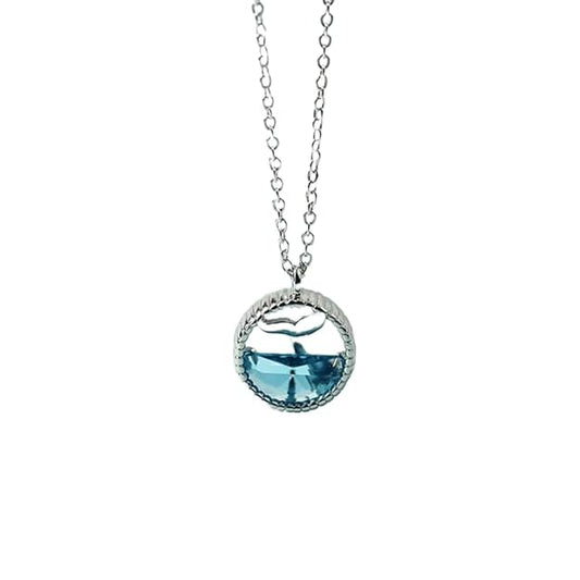 Stylish silver chain necklace featuring a blue whale charm.
