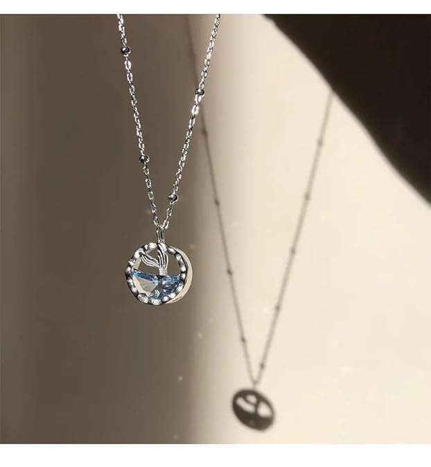 Show off your love for marine life with this blue whale necklace on a silver chain.
