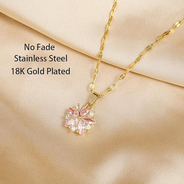 Gold plated necklace with flower pendant, elegant jewelry piece for special occasions.