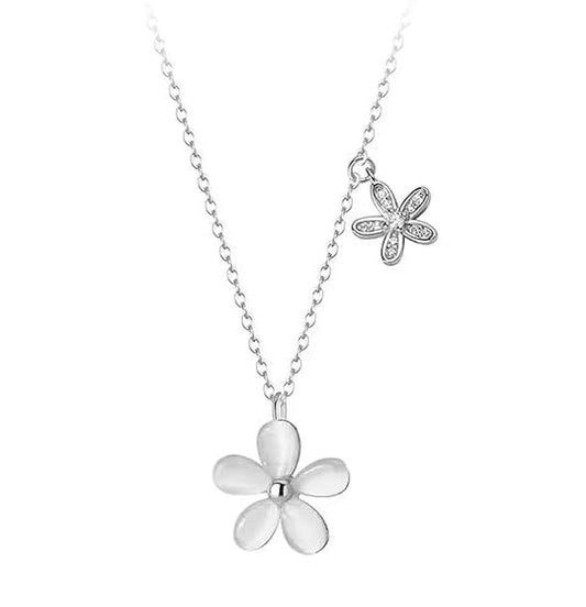 Elegant silver necklace featuring a flower charm.