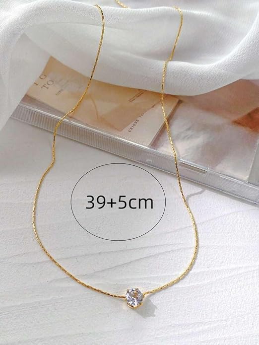 A beautiful necklace with a diamond stone on gold plating.