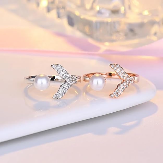 Gold plated ring featuring a pearl and diamond