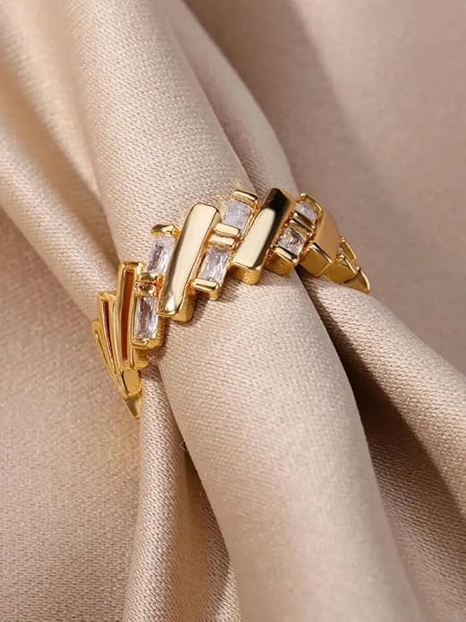 Gorgeous ring made of gold with three rows of glistening diamonds.
