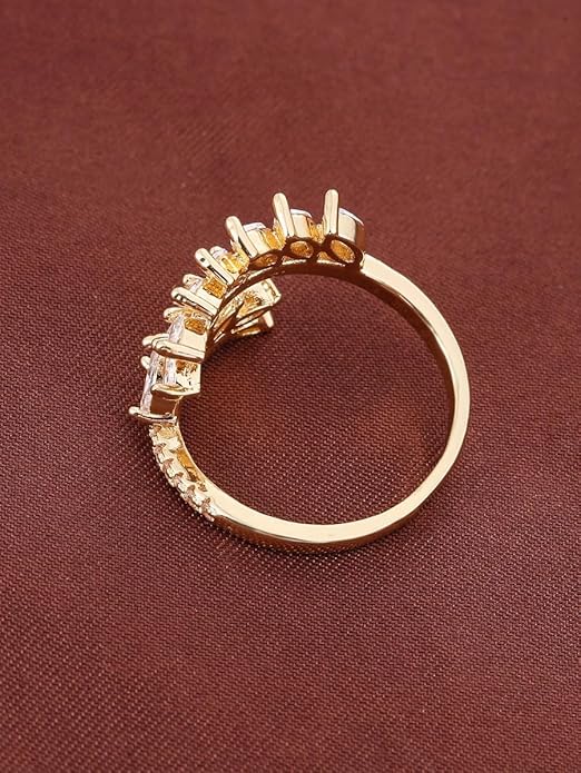 An elegant gold ring with beautiful white diamonds.