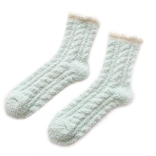 Cozy light green socks accented with white trim, great for lounging or casual outings.
