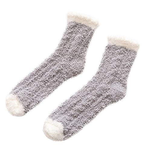 Two pairs of socks featuring a stylish design with white trim, neatly arranged for display.