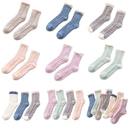 Two pairs of socks, characterized by their white trim, presented together to emphasize their complementary designs.