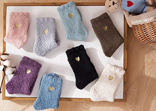 Fun blue socks with a heart detail on the side, perfect for adding a pop of color and warmth to your wardrobe.