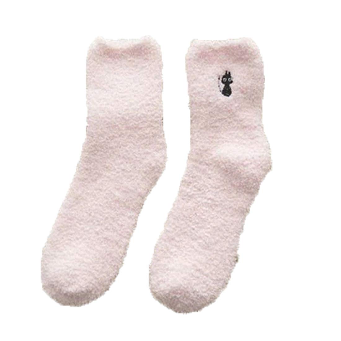 A pair of pink socks featuring a playful cat design, perfect for adding a whimsical touch to any outfit.