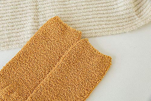 Two cat-themed socks resting on a white background, highlighting their unique patterns and cheerful appearance.
