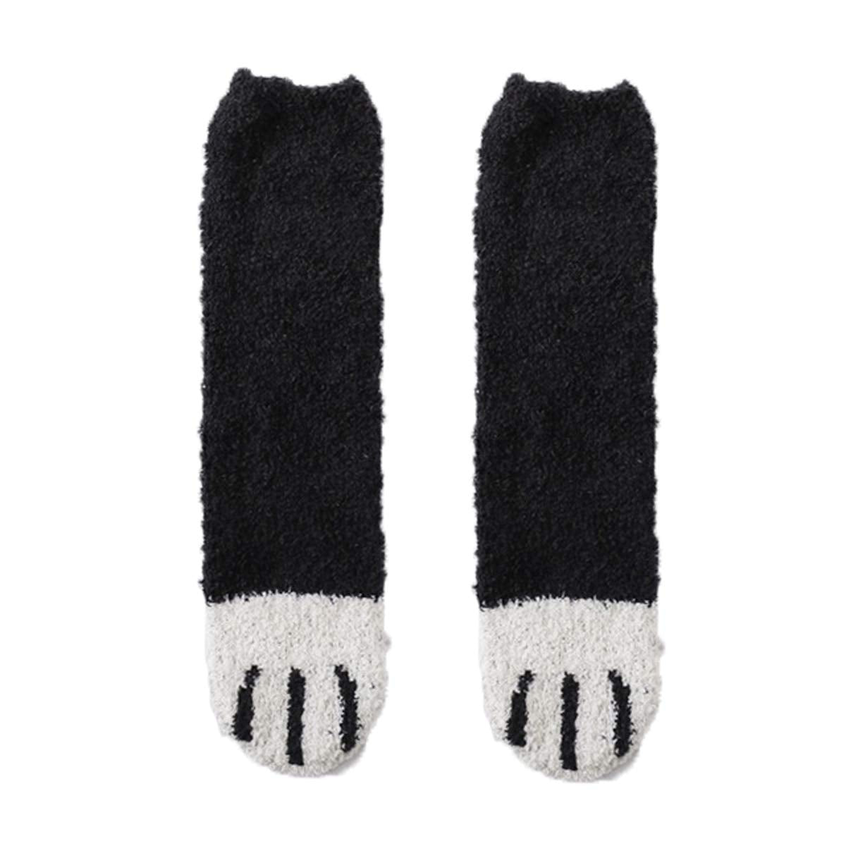 A cozy pair of black and white cat socks, perfect for keeping your feet warm and stylish.