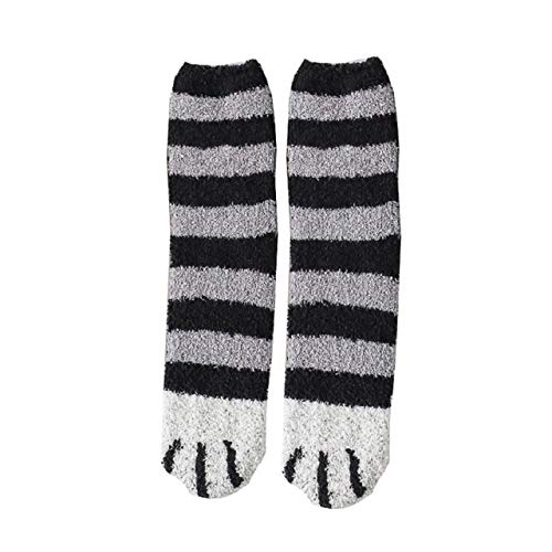 Striped socks showcasing a classic black and white pattern, perfect for adding style to any outfit.