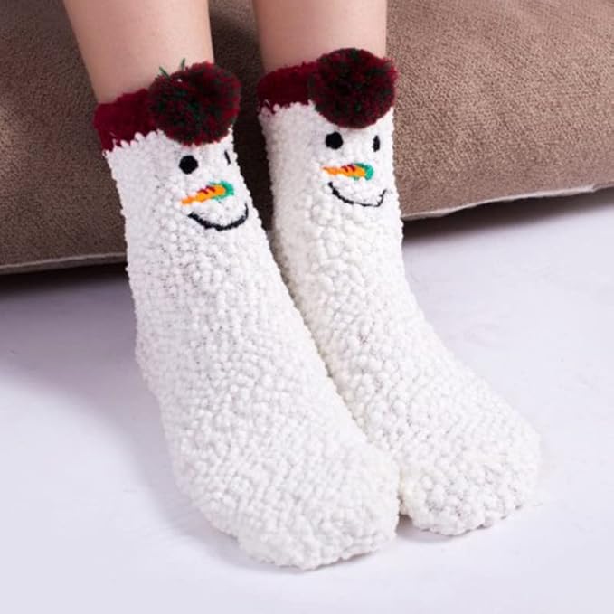 Two pairs of socks featuring cheerful snowmen designs, perfect for winter festivities and cozy wear.