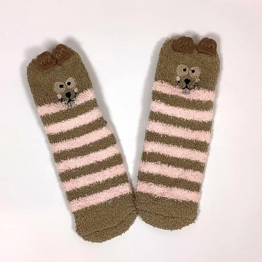 Cozy socks adorned with a playful bear face, ideal for keeping your feet warm and stylish.