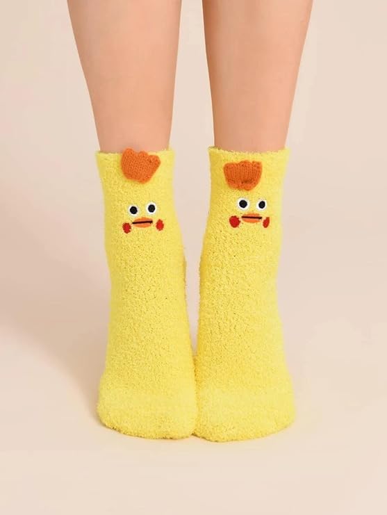 A woman sporting vibrant yellow socks with cute chicken designs, showcasing her fun and playful fashion sense.