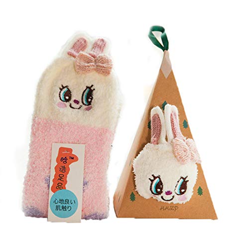 A cute pair of bunny socks placed beside a colorful gift box, perfect for cozying up or gifting to a friend.
