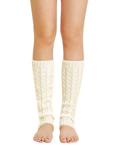 A woman displays her crossed legs adorned with white leg warmers, highlighting a blend of comfort and style.