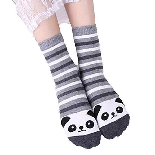 A woman shows off her playful panda socks, featuring fun stripes that add a cheerful touch to her outfit.
