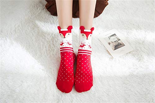 Four pairs of holiday socks showcasing fun reindeer and Santa Claus patterns, bringing joy to your festive wardrobe.