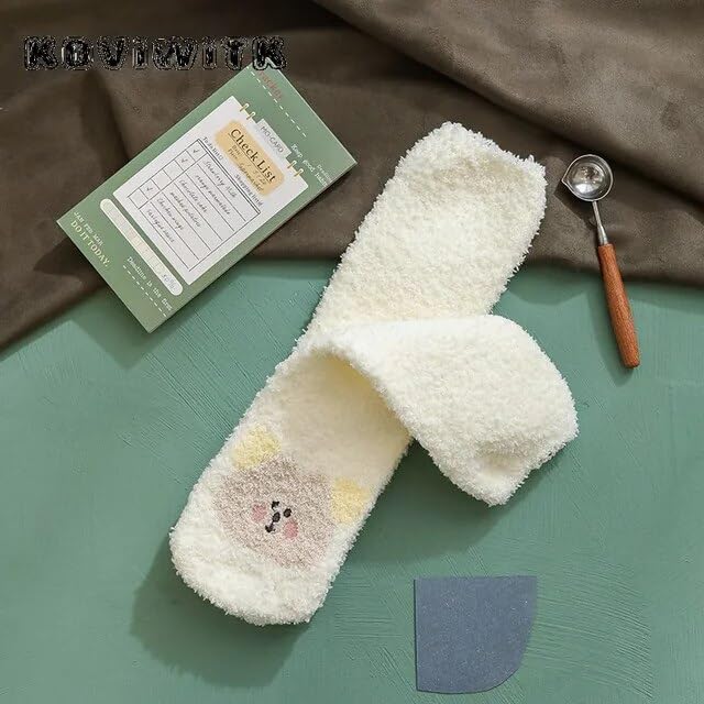 A quirky image of a pair of socks alongside two pairs of scissors, showcasing a fun and playful vibe.