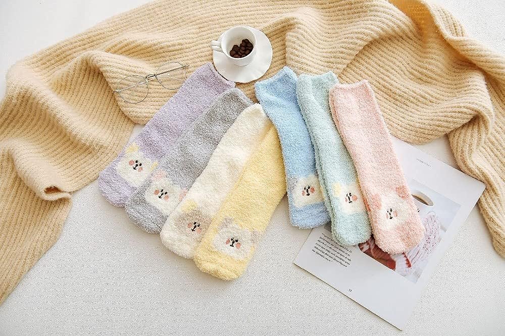 Fun and comfy socks showcasing a bear motif, great for casual wear or relaxing at home.