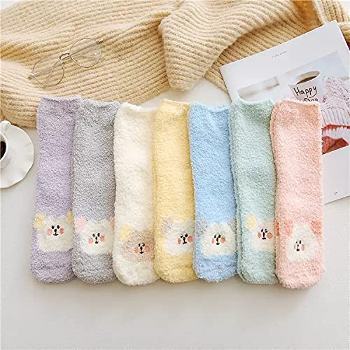 A charming pair of women's socks adorned with a playful bear, ideal for keeping your feet warm and stylish.