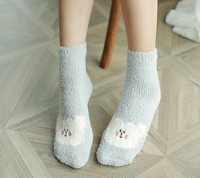 Cute socks featuring an adorable cat design, perfect for any cat lover's wardrobe.