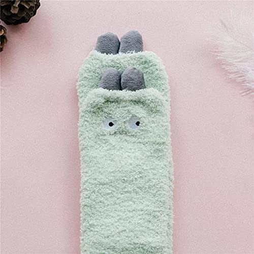 A plush green toy with a cheerful face, perfect for cuddling and imaginative play.