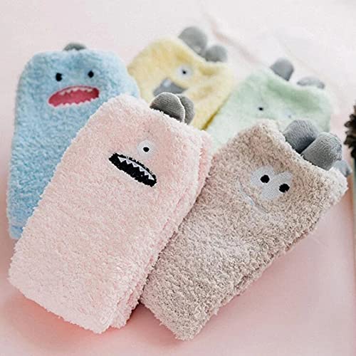 A soft green stuffed creature adorned with a smiling face, ideal for children and collectors alike.