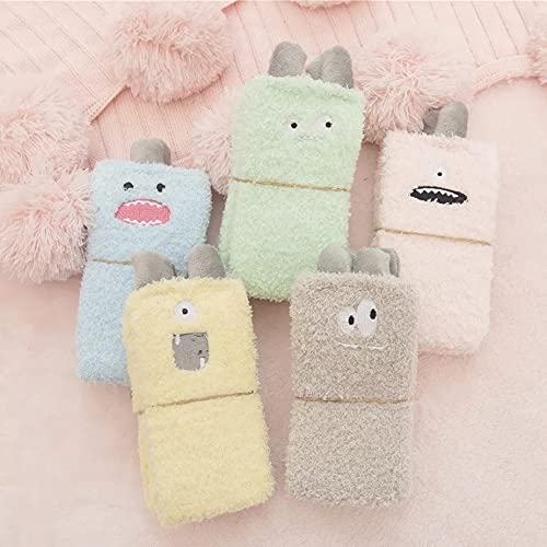 A pink towel showcasing a friendly face, combining functionality with a fun aesthetic for everyday use.