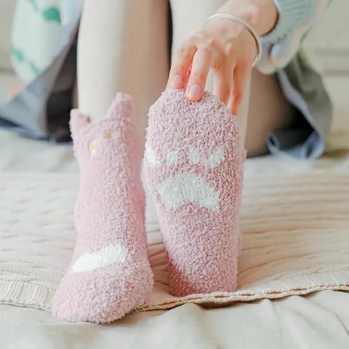 A person wearing whimsical cloud-patterned socks, showcasing a playful and creative fashion choice.